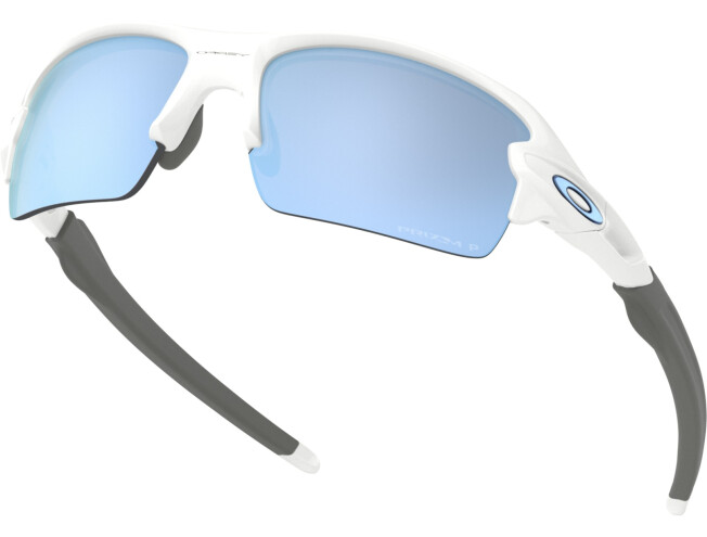 Päikeseprillid OAKLEY Flak XS Polished White Prizm Deep Water Polarized